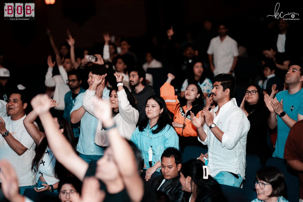 The crowd clapping and cheering at a B.O.B Events show