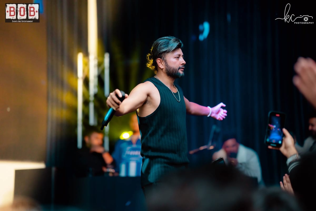 A performer on stage at a B.O.B Events show with Durgesh Thapa